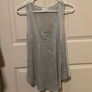 sheer, patterned tank top. H.I.P. Brand size small